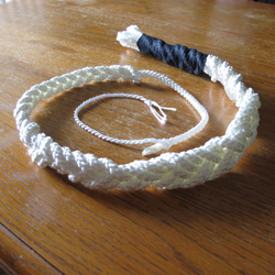 Coiled nylon rope whip